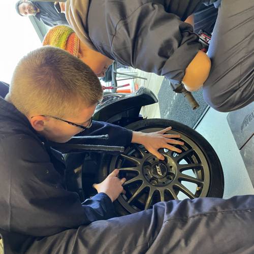 Motorsport Engineering students working on the car that will compete at the Student Motorsport Challenge