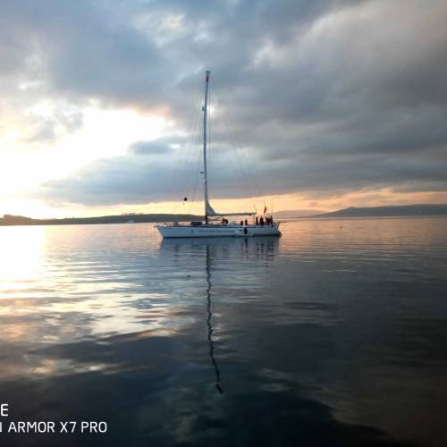 Sailing boat on the calm sea