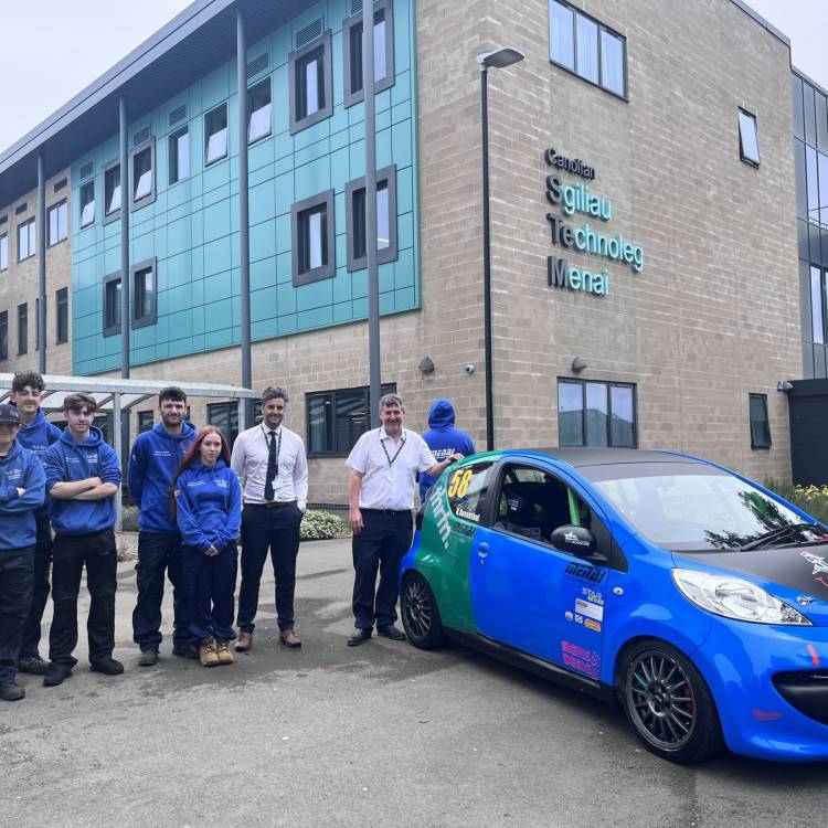 Motorsport Engineering students with the Peugeot 107 that will compete at the Student Motorsport Challenge