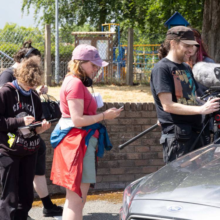 Coleg Menai students filming Carreg Gron