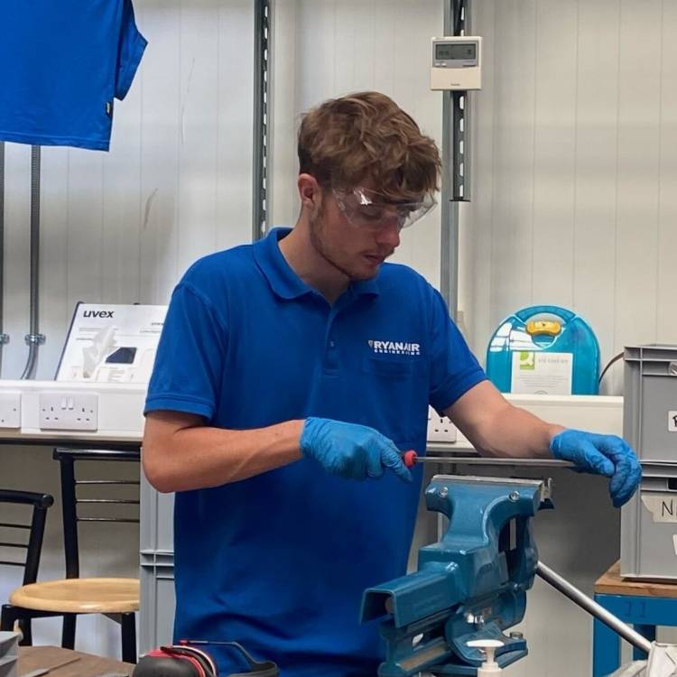 Tomos Jones working at Stansted Airport as an apprentice with Ryanair Engineering