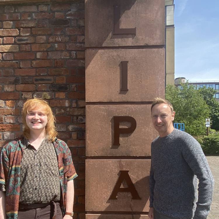 Former Coleg Llandrillo student Alex Snape at LIPA with Tim Sherratt, strategic planning manager at Sennheiser