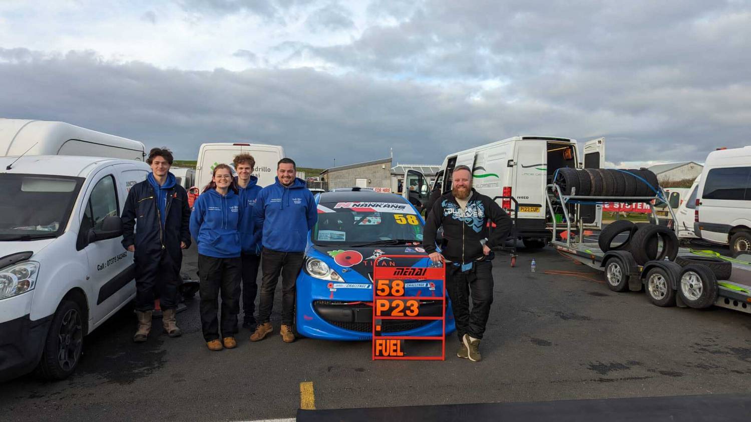 Driver Hywel Rosenthal and the Menai Motorsports team with the Peugeot at Trac Môn