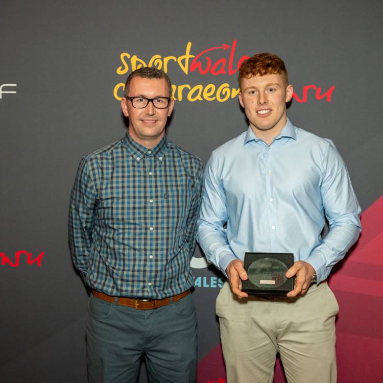 Celt Ffransis being presented with the Junior Sportsman of the Year award at the Môn Actif Sports Awards 2023