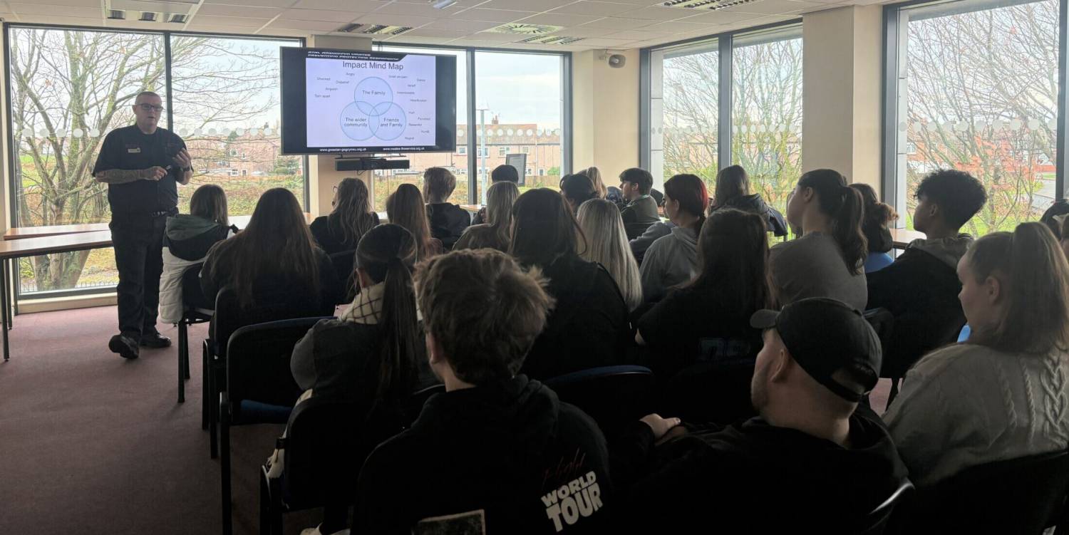 A North Wales Fire and Rescue Service officer delivering a lesson on road safety to students at Coleg Llandrillo’s Rhyl campus