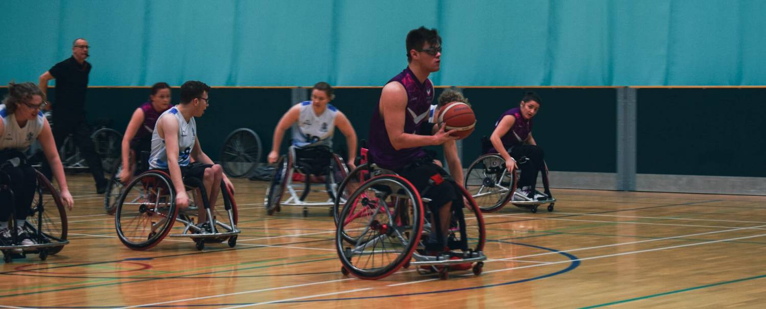 Alex Marshall-Wilson playing wheelchair basketball for Loughborough University