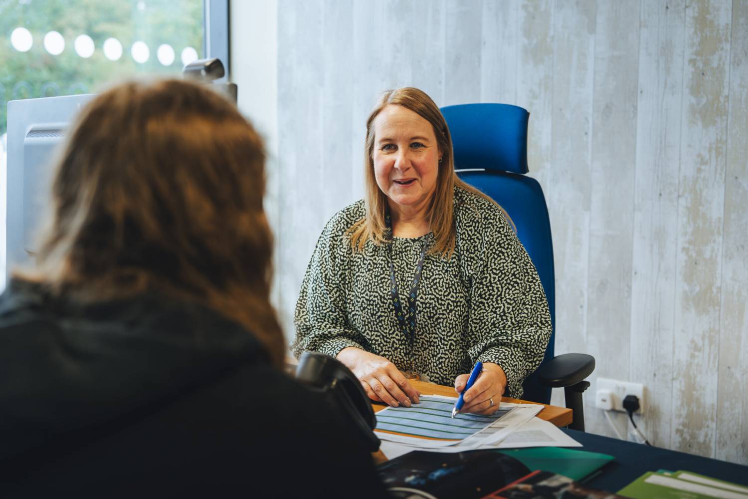 Student advisor smiling