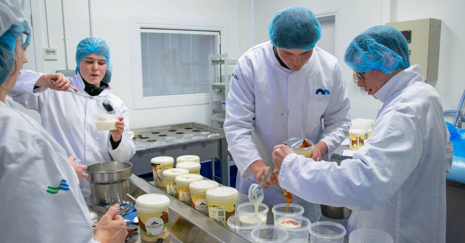 Students making ice cream as part of a dairy workshop at the Food Technology Centre in Llangefni