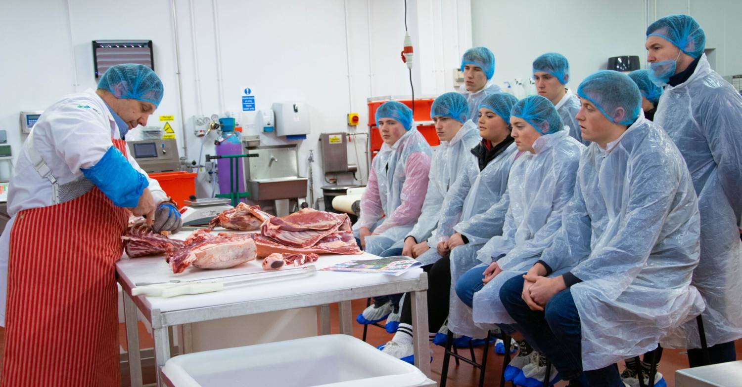 Food technologist Karl Jones giving a butchery demonstration to students at the Food Technology Centre in Llangefni