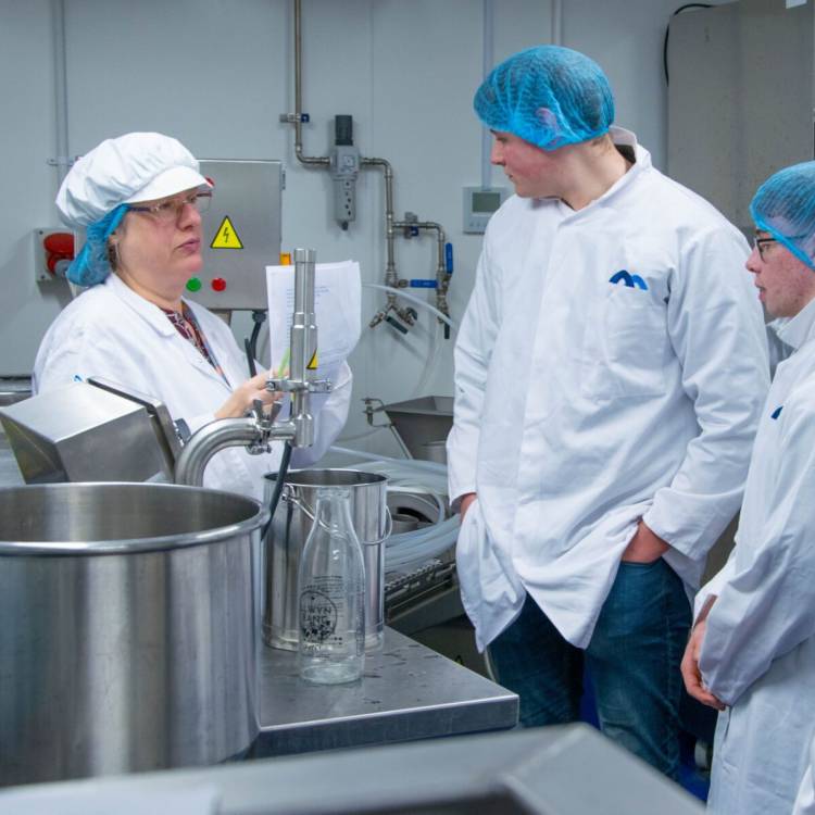 Food technologist Julia Skinner talking to students during a dairy workshop at the Food Technology Centre in Llangefni