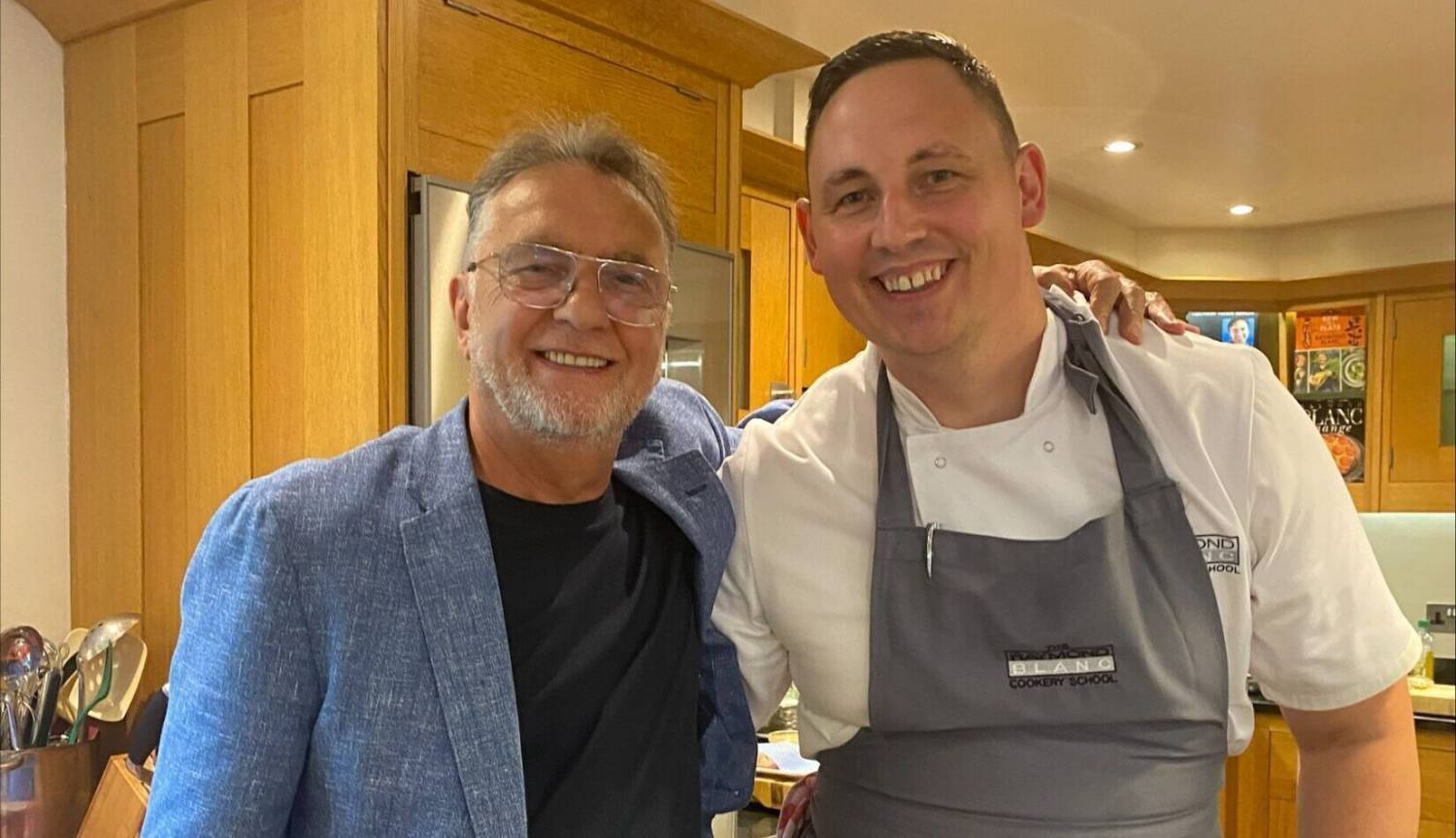 Former Coleg Menai student Michael John with Raymond Blanc