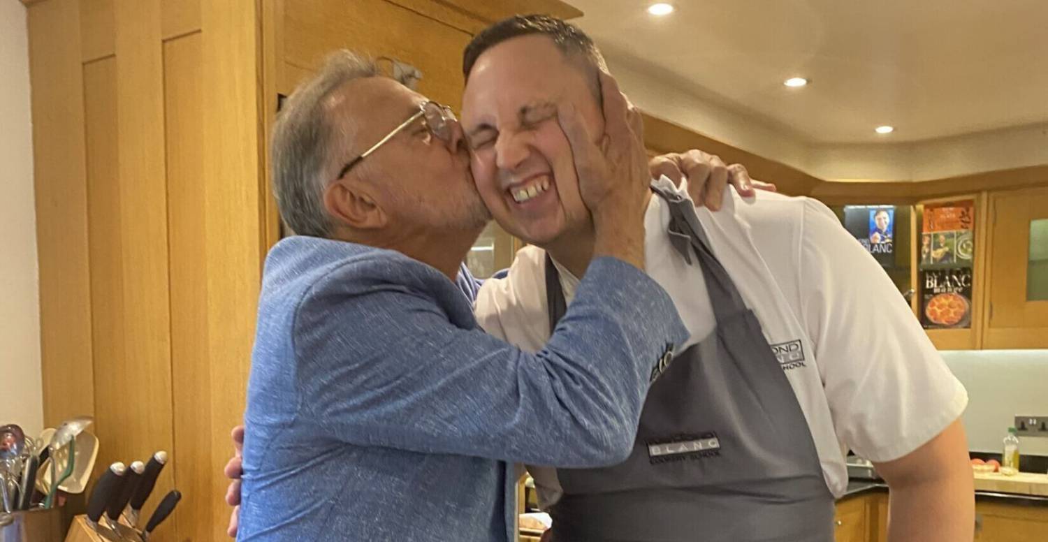 Former Coleg Menai student Michael John with Raymond Blanc
