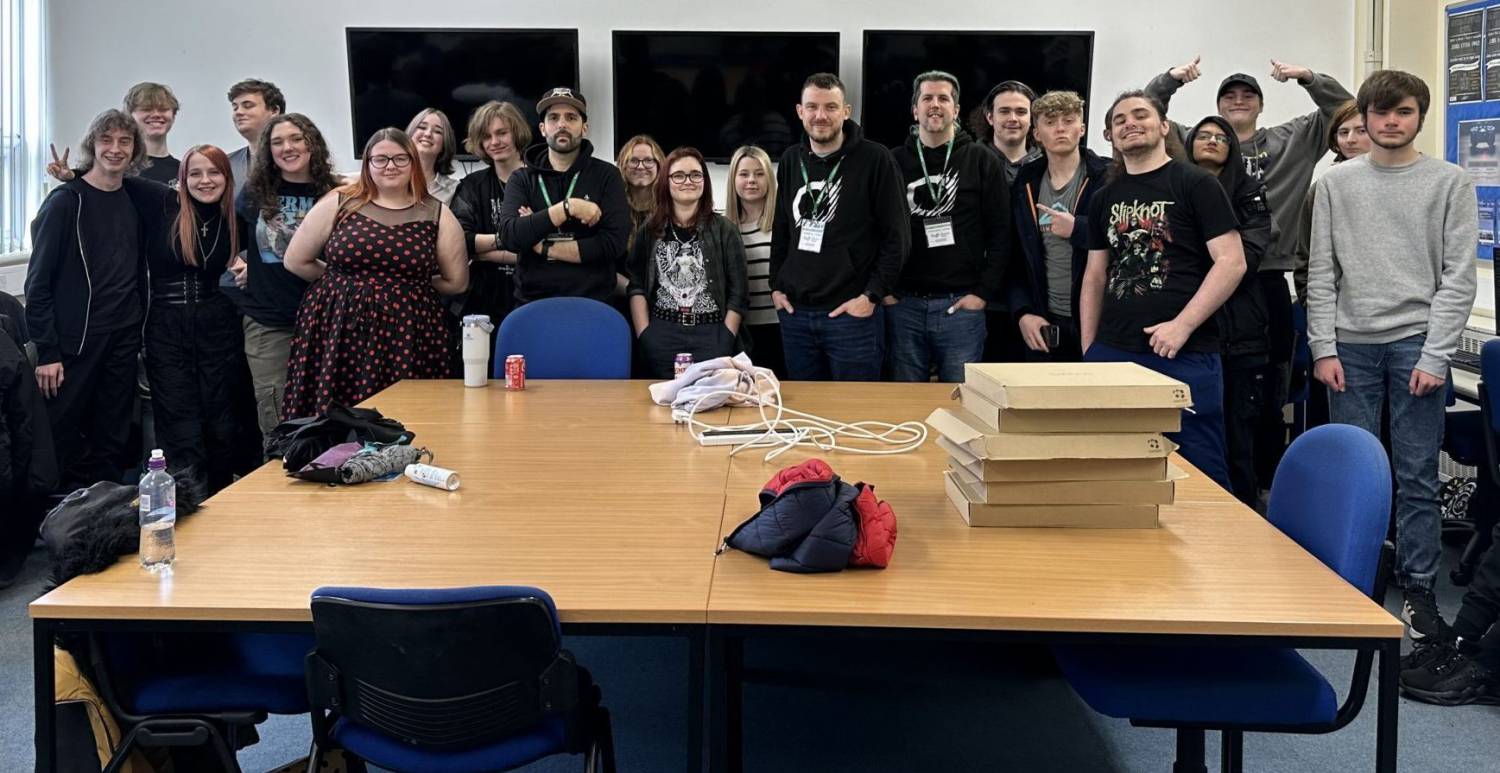 Coleg Llandrillo students with games developers Mark Gregory, Stuart Ralphson and Modie Shakarchi