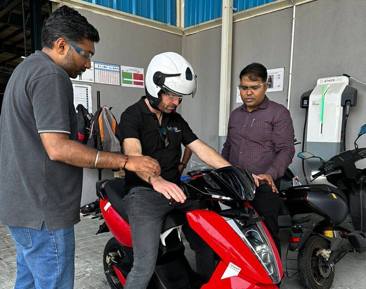 Coleg Llandrillo lecturer Paul Griffith trying an electric bike in India