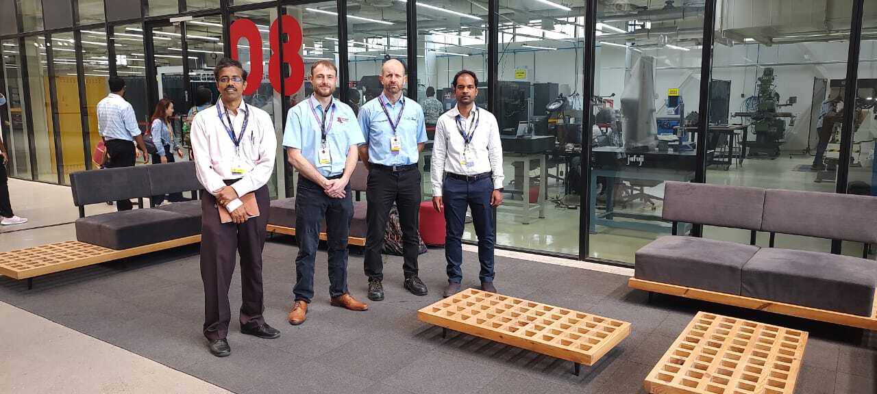 Coleg Llandrillo lecturer Paul Griffith and NPTC lecturer Will Davies with other delegates on their trip to India